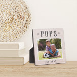 Rustic Personalised Pops Grandpa Photo Plaque<br><div class="desc">Custom grandpa plaque for Father's Day,  birthdays,  or Grandparents Day features a favourite photo of his grandchild or grandkids with "Pops" above in rustic lettering. Personalise with the year he became a grandfather beneath,  or add a custom message or name.</div>