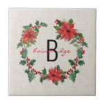 Rustic Poinsettia & Holly Wreath Monogrammed Ceramic Tile<br><div class="desc">A festive,  poinsettia and holly Christmas wreath surrounds initial and name on this rustic,  tile. You can easily personalise your tile using Zazzle's easy to use design tool. Background is a simple,  natural burlap. Makes a very thoughtful Gift. Part of a collection.</div>