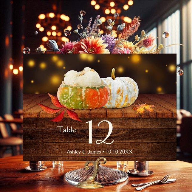 Rustic Pumpkins Fall Wedding Table Number Card (Table number card featuring colorful pumpkins and fall leaves on rustic wood and sparkling lights )
