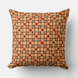 Rustic reddish orange chess parts forming squares cushion