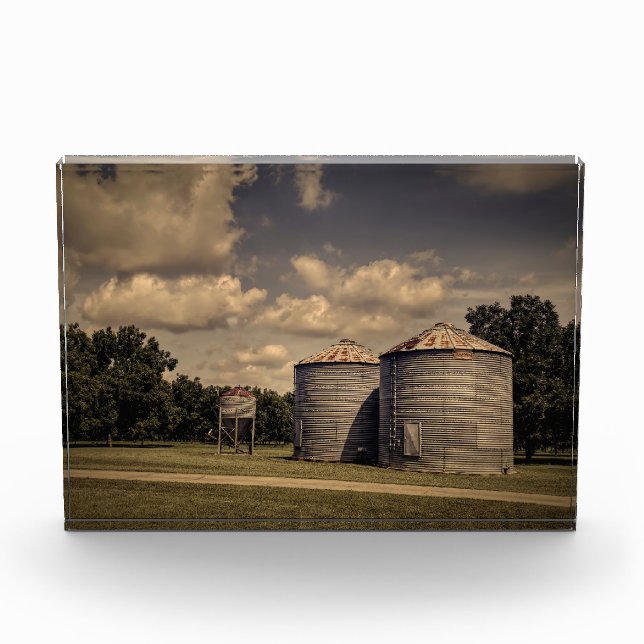 Rustic Silos in a Sleepy Scene Under Fluffy Clouds Photo Block (Front)