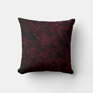 Rustic spongy red on dark background cushion