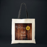 Rustic sunflower on wood Welcome wedding Tote Bag<br><div class="desc">Rustic sunflower on barn wood wedding welcome tote bag.
Nice welcome bag for your wedding guests.
Add your own names and text and create a very personal and unique wedding bag.</div>