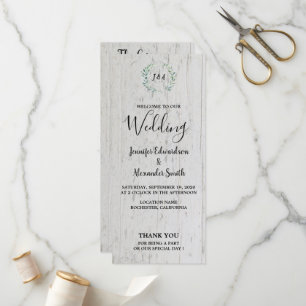Rustic watercolor leaves on barn wood wedding program
