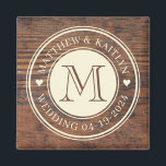 Rustic Wedding Heart Monogram in Dark Walnut Magnet<br><div class="desc">Elevate your rustic wedding décor with the Rustic Wedding Heart Monogram in Dark Walnut Magnet. This charming magnet features a heart monogram design set against a rich dark walnut background, adding a personalised touch to any magnetic surface. Whether used to secure important notes or to adorn your refrigerator with sentimental...</div>