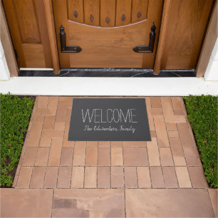 Rustic welcome script family name doormat