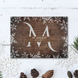 Rustic Winter Snowflakes Monogram Faux Wood Cutting Board<br><div class="desc">This rustic design features an elegant monogram accented with a border of snowflakes, on a faux wood background. This is great for a Christmas gift for newlyweds, a wedding gift or a housewarming gift. Click the customise button for more flexibility in adjusting the text! Variations of this design as well...</div>