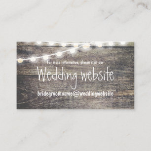 Rustic wood and string lights wedding website enclosure card