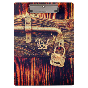 Rustic wood door with antique brass lock clipboard