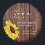 Rustic Wood Wedding Sunflower Save The Date Magnet<br><div class="desc">Simple and elegantly rustic are the words I would use to describe this Save The Date magnet... featuring a single sunflower, over a rustic wood design, surrounded by elegant script calligraphy. This unique boho chic design is a fun way to announce your engagement and sets the stage for a day...</div>