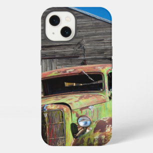Rusting car in front of abandoned farm iPhone case