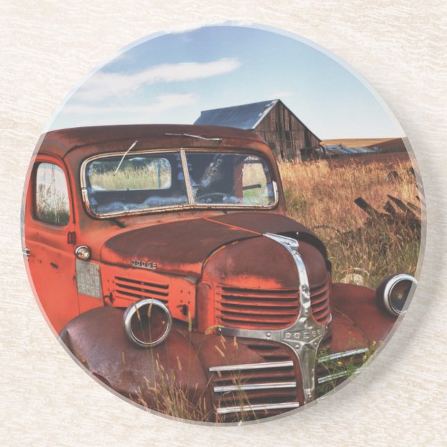 Rusting orange Dodge truck with abandoned farm Coaster (Front)