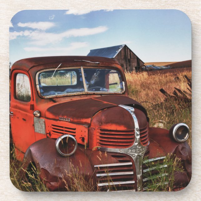 Rusting orange Dodge truck with abandoned farm Coaster (Front)