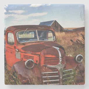 Rusting orange Dodge truck with abandoned farm Stone Coaster