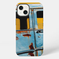 Rusty Blue Car and Yellow Wall