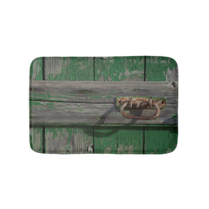 Rusty Door Handle On Green Door Bath Mat