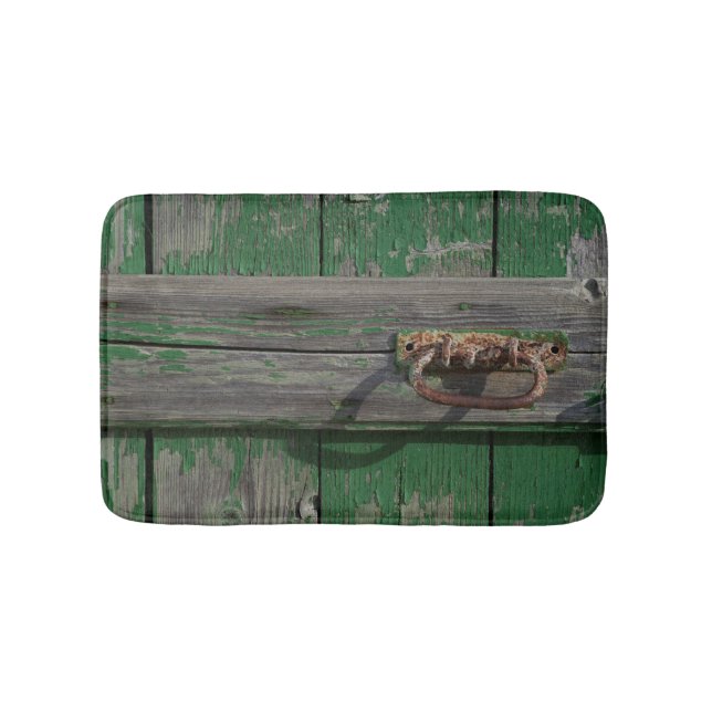 Rusty Door Handle On Green Door Bath Mat (Front)