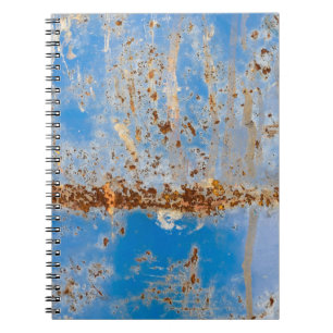 Rusty metal texture, blue scratchy decor. notebook
