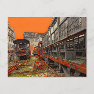Rusty old locomotives and train wagons postcard
