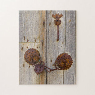 Rusty vintage old iron padlock on a wooden door `` jigsaw puzzle