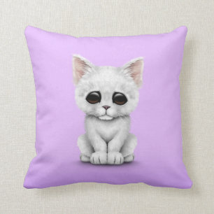 Sad Cute White Kitten Cat on Purple Cushion
