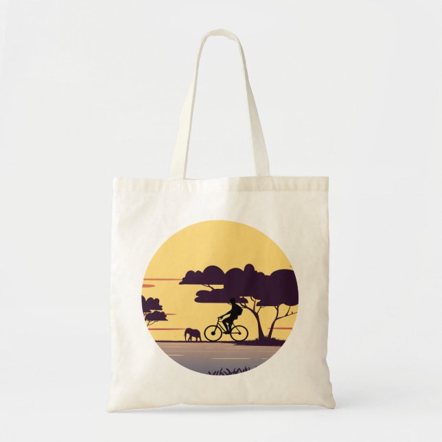 Safari Bike Ride at Sunset – Cyclist and Elephant  Tote Bag (Front)