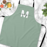 Sage Green Modern Minimalist Elegant Monogram Apron<br><div class="desc">Personalised Custom Create Your Own Modern Sage Green and White Initial Name Monogram Apron. This chic and sophisticated apron is perfect for anyone who wants to add a personalised and elegant touch to their work attire. Whether you're a home chef preparing meals in the kitchen, a hair stylist in need...</div>