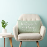 Sage Green Script Welcome to Our Home Lumbar Cushion<br><div class="desc">Soft sage green and white bring a calming,  organic warmth to this personalised indoor lumbar pillow featuring Welcome to Our Home in flowing script with your family name. The trendy muted green complements farmhouse,  boho,  and modern interiors alike. All text is fully customisable.</div>