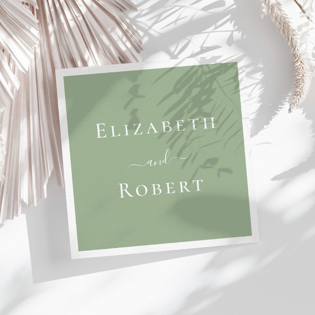 Sage Green Simple Minimalist Couple Names Wedding Napkin (Sage Green Simple Minimalist Couple Names Wedding Napkins on a sunny table with white dry flowers)
