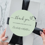 Sage green thank you heart wedding classic round sticker<br><div class="desc">A sage green coloured background.  With the text: Thank you for sharing our special day,  with a small heart.   Personalise and add your names.</div>