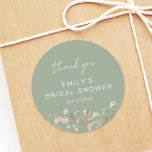 Sage Green Wildflower Thank You Bridal Shower Classic Round Sticker<br><div class="desc">Express gratitude with our Wildflower Thank You Bridal Shower In Bloom Classic Round Sticker. These charming stickers feature a delightful wildflower design, infusing a touch of natural beauty into your bridal shower thank-you notes or favours. The classic round shape adds versatility, making them perfect for various uses, from sealing envelopes...</div>