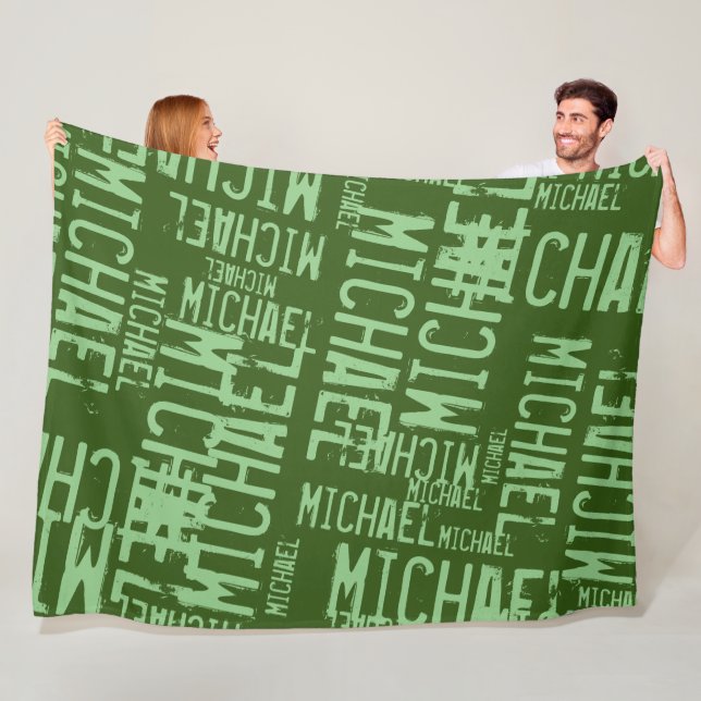 Sage Names repeated on a Forest-Green Fleece Blanket (In Situ)