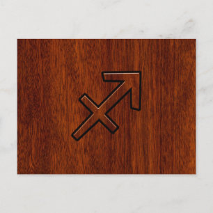 Sagittarius Zodiac Symbol on Mahogany Wood Decor Postcard