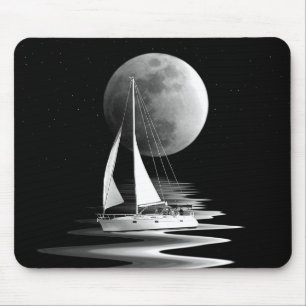 Sailboat on moonlit water mouse pad