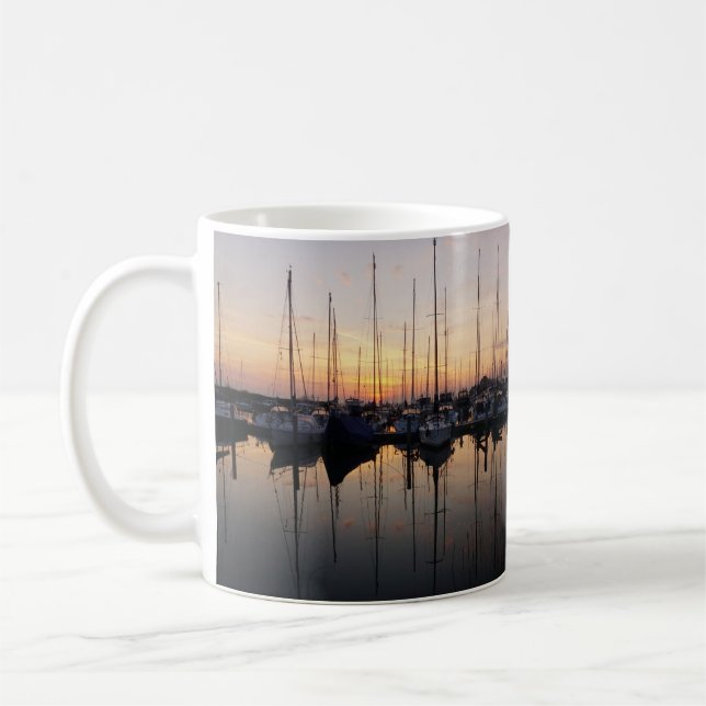 Sailboats in harbor with backlight. coffee mug (Left)
