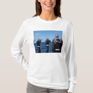 Sailors fire a gun salute during a burial-at-se T-Shirt
