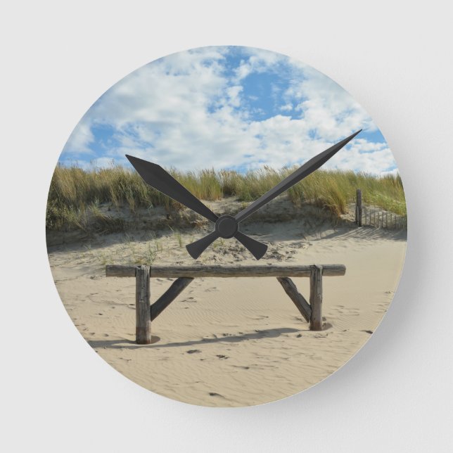 Sand dunes with wooden fence round clock (Front)
