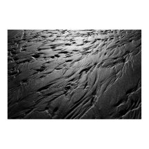 Sand patterns on a beach poster