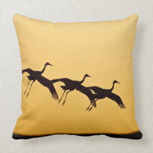 Sandhill Crane landing at sunset Cushion