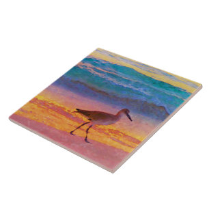 sandpiper on beach at sunset ceramic tile