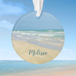 Sandpiper on the Seashore | Beautiful Beach Custom Ornament<br><div class="desc">Beautiful beach ornament with gorgeous seaside photography featuring a pretty sandpiper standing at the edge of the ocean waves on a sunny summer day. Lovely blue green water waves roll onto the sandy shore where your name is personalised in cute teal typography. A beautiful Christmas gift for a daughter, mum,...</div>