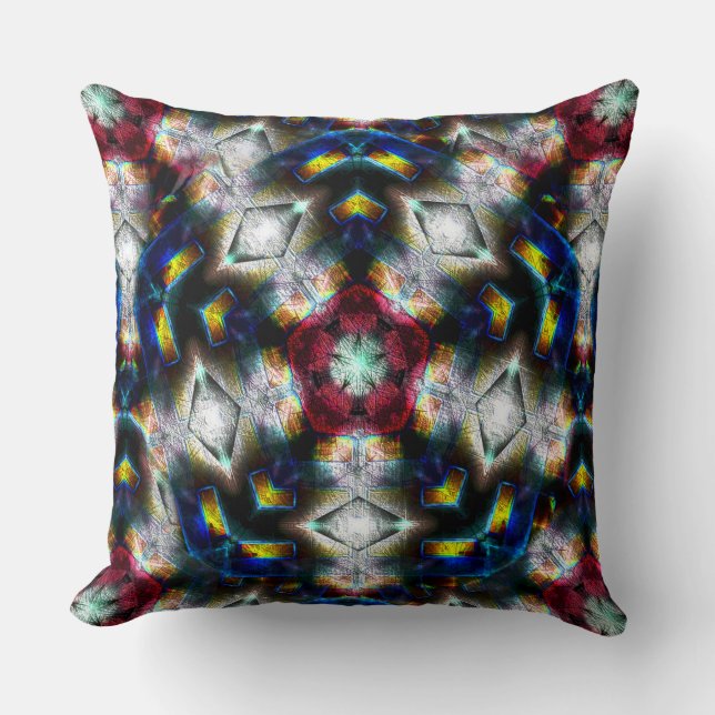 Sandy base with shapes in dark colours and lightin cushion (Front)
