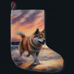 Sandy Paws Akita Dog on Beach Sunset Small Christmas Stocking<br><div class="desc">Immerse yourself in the tranquil beauty of our "Sandy Paws and Sunset Hues" dog on beach sunset design. This captivating scene captures the essence of a perfect evening at the shore, with a loyal canine companion enjoying the golden sands and the breathtaking hues of the setting sun. Whether you're a...</div>