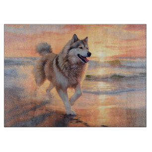Sandy Paws Alaskan Malamute Dog on Beach Sunset Cutting Board