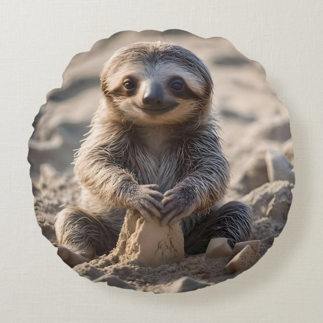 Sandy Shores: Baby Sloth Building Sand Castles, Round Cushion (Front)