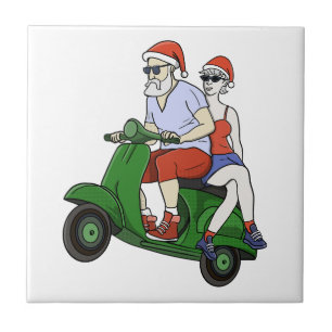 Santa and Mrs. Claus riding a scooter Ceramic Tile