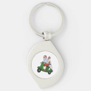 Santa and Mrs. Claus riding a scooter Key Ring