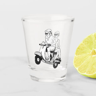 Santa and Mrs. Claus riding a scooter Shot Glass