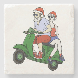 Santa and Mrs. Claus riding a scooter Stone Coaster