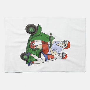 Santa and Mrs. Claus riding a scooter Tea Towel